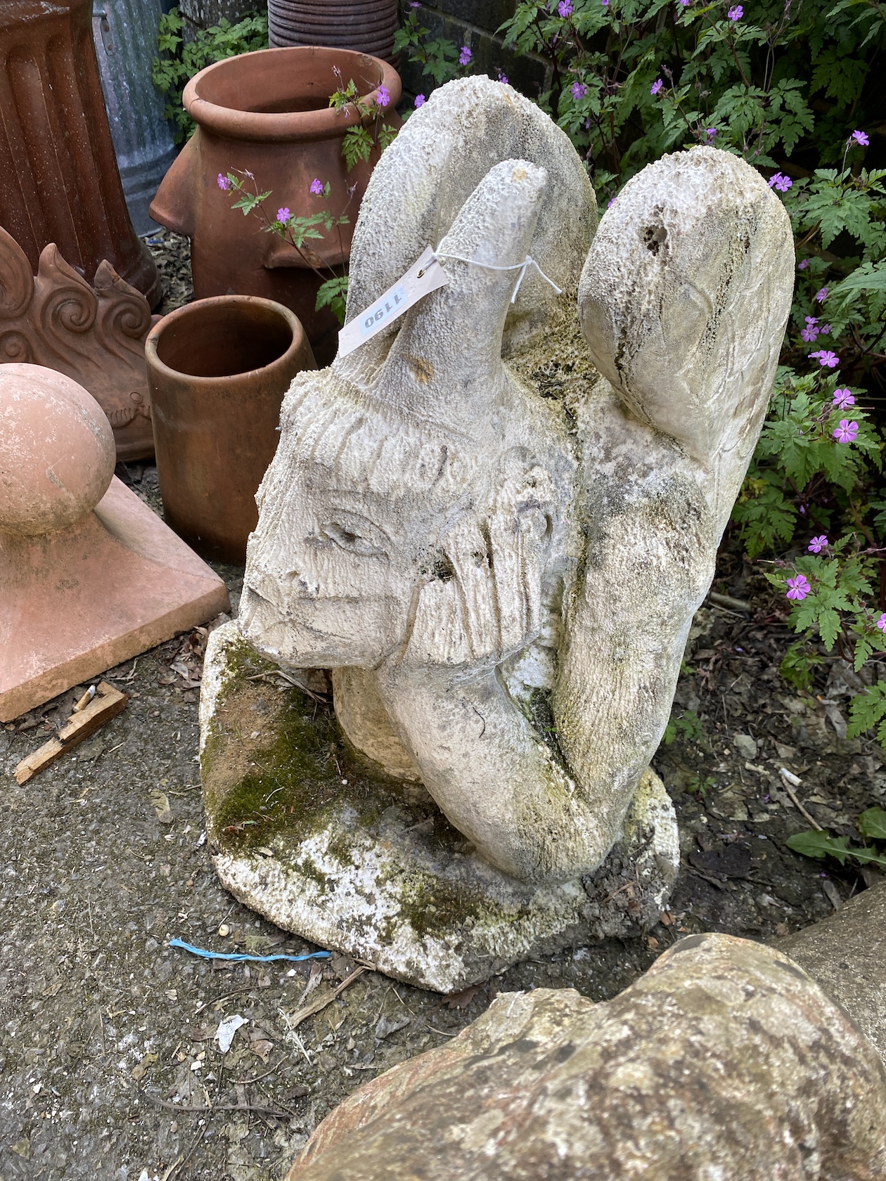 A reconstituted stone gargoyle ornament, height 56cm *Please note the sale commences at 9am.